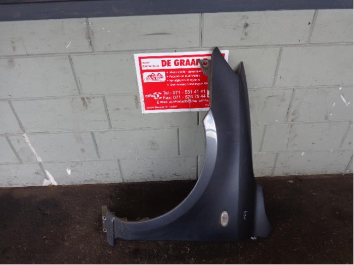 Framskärm, vänster från en Mazda 2 (NB/NC/ND/NE) 1.4 16V 2004