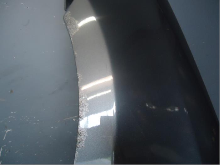 Framskärm, vänster från en Mazda 2 (NB/NC/ND/NE) 1.4 16V 2005