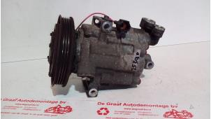 Używane Pompa klimatyzacji Nissan Note (E11) 1.4 16V Cena € 125,00 Procedura marży oferowane przez de Graaf autodemontage B.V.