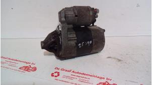 Używane Rozrusznik Nissan Note (E11) 1.4 16V Cena € 40,00 Procedura marży oferowane przez de Graaf autodemontage B.V.