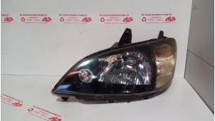 Begagnade Strålkastare, vänster Daihatsu YRV (M2) 1.0 12V DVVT STi Pris € 30,00 Marginaltabell erbjuds av de Graaf autodemontage B.V.