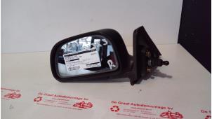 Gebruikte Buitenspiegel links Mitsubishi Colt (CJ) 1.3 GL,GLX 12V Prijs € 20,00 Margeregeling aangeboden door de Graaf autodemontage B.V.