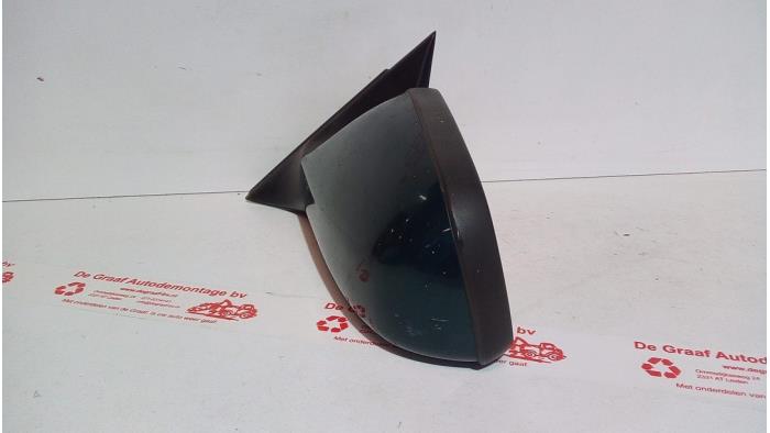 Buitenspiegel links van een Opel Astra F Caravan (51/52) 1.6i 16V 1996