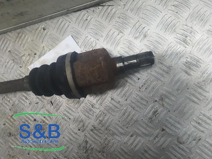 Drivaxel, vänster fram från en MINI Mini (R56) 1.6 16V Cooper S 2006