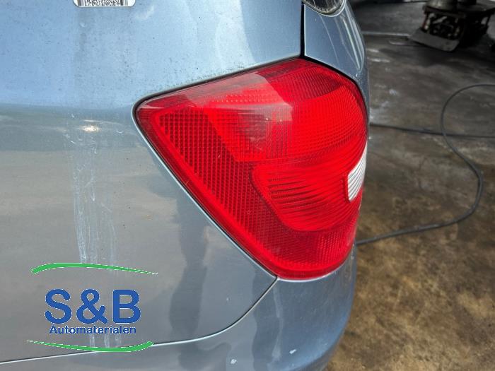 Taillight, left from a Skoda Fabia II Combi 1.2 TSI 2010