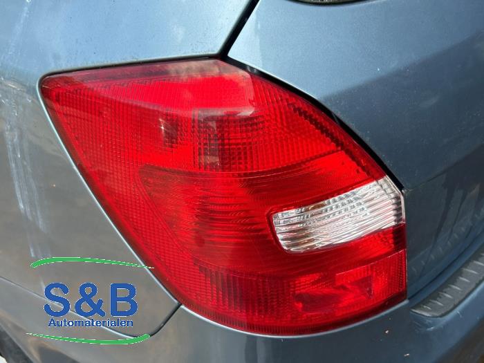 Taillight, left from a Skoda Fabia II Combi 1.2 TSI 2010