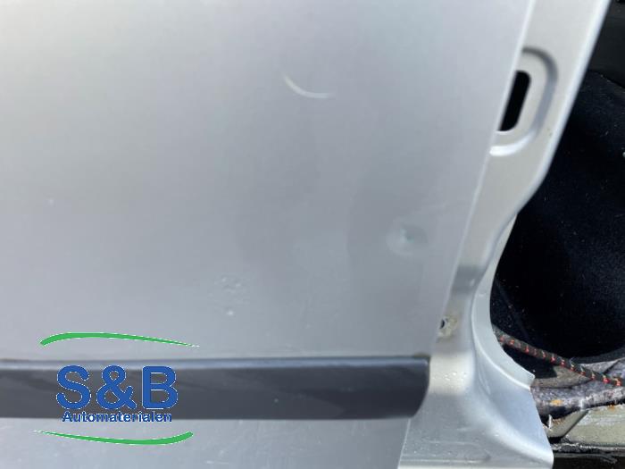 Door 4-door, front left from a Skoda Fabia II Combi 1.2 TDI 12V Greenline 2011