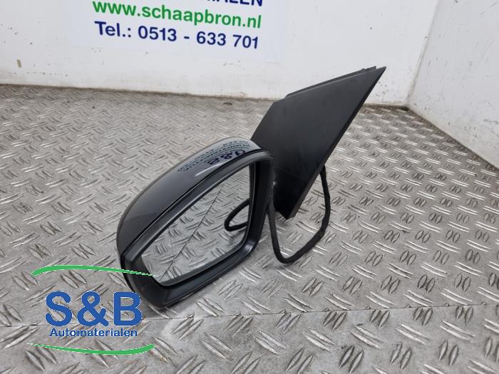 Buitenspiegel links van een Volkswagen Polo V (6R) 1.2 TSI 16V BlueMotion Technology 2015
