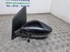 Buitenspiegel links van een Volkswagen Polo V (6R) 1.2 TSI 16V BlueMotion Technology 2015