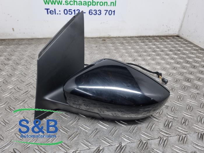 Buitenspiegel links van een Volkswagen Polo V (6R) 1.4 TDI DPF BlueMotion technology 2015