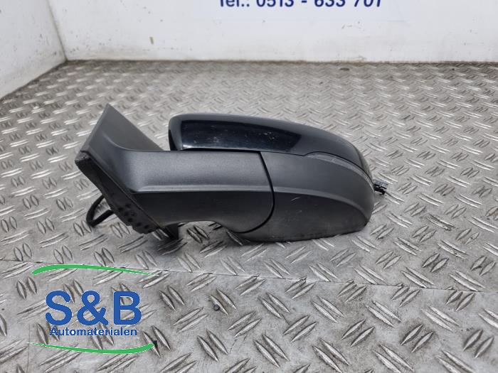 Buitenspiegel links van een Volkswagen Polo V (6R) 1.4 TDI DPF BlueMotion technology 2015