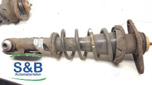 Gebruikte Veerpoot links-achter Mini Mini (R56) 1.6 16V Cooper S Prijs € 40,00 Margeregeling aangeboden door Schaap & Bron