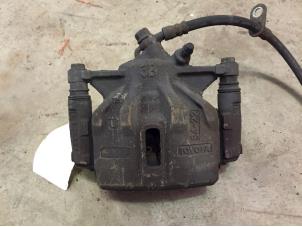 Begagnade Främre bromsok, vänster Toyota Corolla (E11) 1.6 16V Pris € 20,00 Marginaltabell erbjuds av F. van den Mosselaar autodemontage