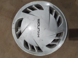 Begagnade Hjulskydd (reserv) Hyundai S-coupe 1.5i GS,GT,GTX Pris € 10,00 Marginaltabell erbjuds av F. van den Mosselaar autodemontage
