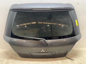 Używane Tylna klapa Mitsubishi Outlander (CU) 2.0 16V 4x2 Cena € 125,00 Procedura marży oferowane przez F. van den Mosselaar autodemontage