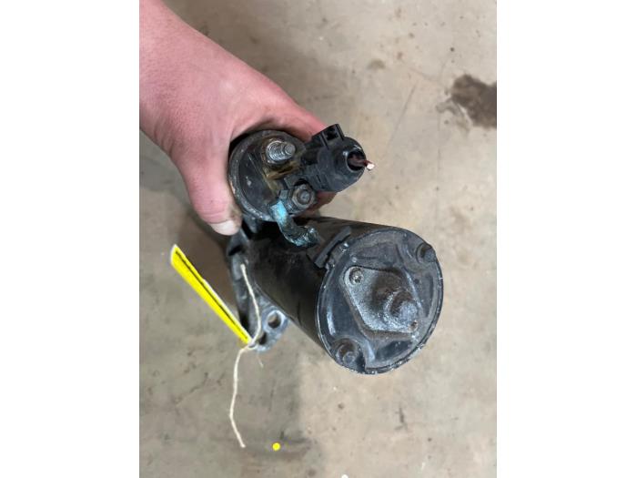 Startmotor från en Volkswagen Polo IV (9N1/2/3) 1.4 TDI 80 2009