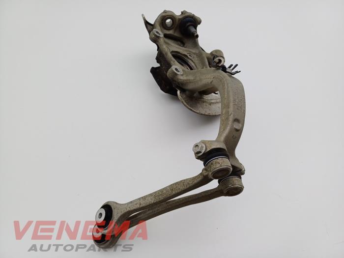 Spindel, höger fram från en Audi A5 Cabrio (F57/F5E) 3.0 TDI V6 24V Quattro 2017