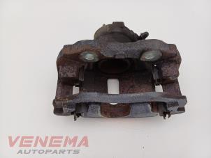 Begagnade Främre bromsok, höger Opel Corsa F (UB/UH/UP) 1.2 12V 75 Pris € 44,99 Marginaltabell erbjuds av Venema Autoparts