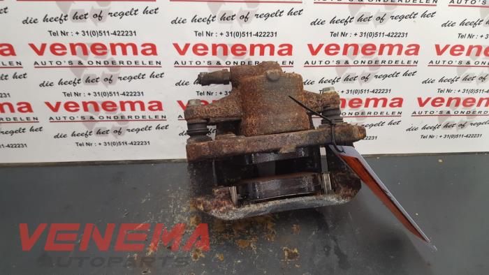 Främre bromsok, vänster från en Opel Corsa D 1.2 16V 2009