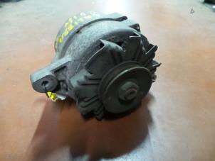 Begagnade Dynamo Opel Calibra Pris på förfrågan erbjuds av N Kossen Autorecycling BV