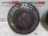 Svänghjul från en Opel Agila (A) 1.2 16V 2001