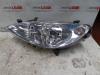 Strålkastare, vänster från en Peugeot 307 2005