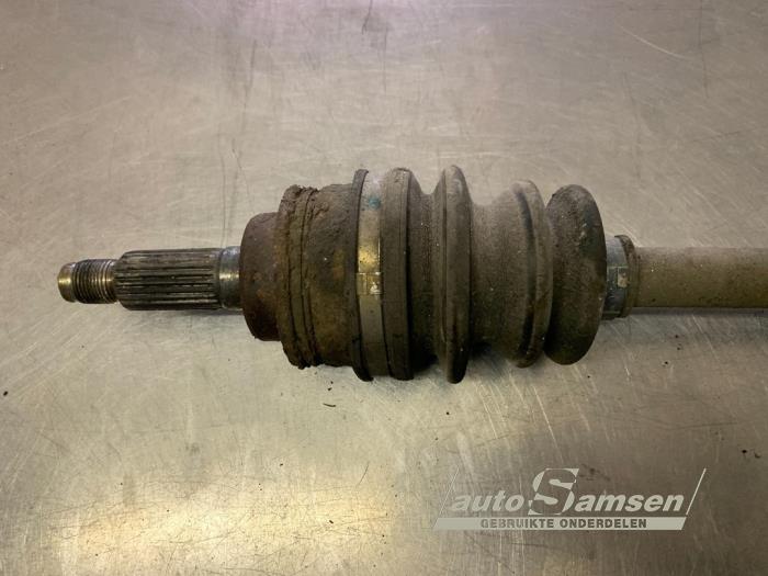 Drivaxel, vänster fram från en Suzuki Ignis (FH) 1.3 16V 2003