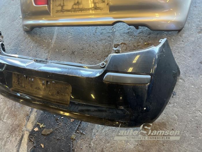 Bakre stötfångare från en Renault Clio III (BR/CR) 1.4 16V 2007