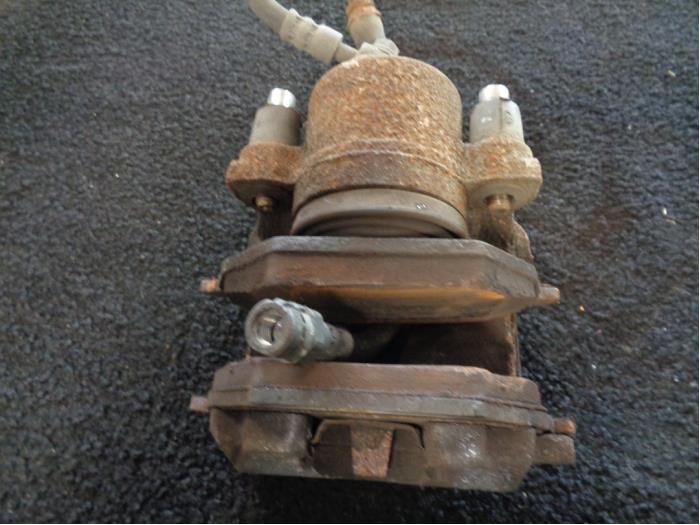 Främre bromsok, vänster från en Volkswagen Up! (121) 1.0 12V 60 2015