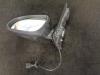 Buitenspiegel links van een Opel Astra J GTC (PD2/PF2) 2.0 CDTI 16V ecoFLEX 2011