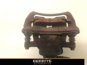 Begagnade Främre bromsok, vänster Mitsubishi Colt (Z2/Z3) 1.3 16V Pris € 19,99 Marginaltabell erbjuds av Gerrits Automotive BV