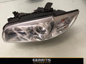 Gebruikte Koplamp links BMW 1 serie (E87/87N) 116i 1.6 16V Prijs € 74,99 Margeregeling aangeboden door Gerrits Automotive BV