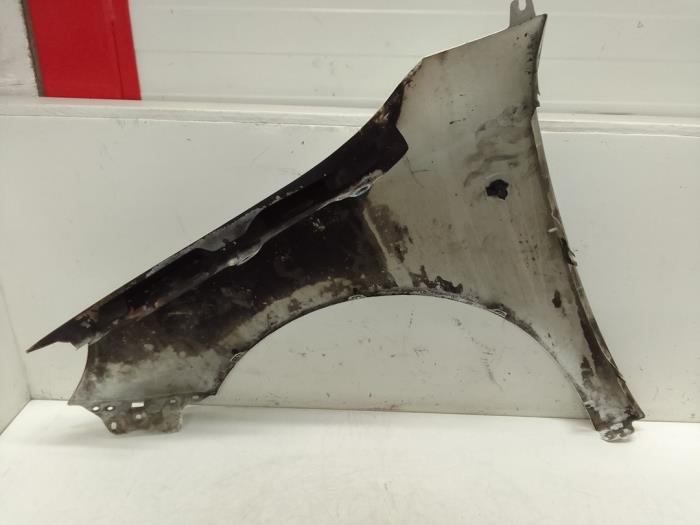 Framskärm, höger från en Skoda Fabia II Combi 1.2 TSI 2013