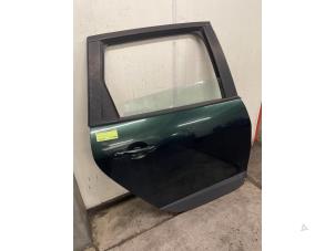 Gebruikte Portier 4Deurs rechts-achter Renault Scénic III (JZ) 2.0 16V CVT Prijs € 250,00 Margeregeling aangeboden door Autodemontage van de Laar