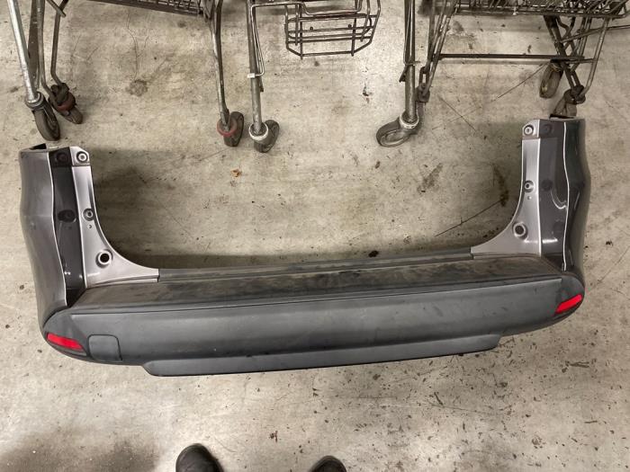 Bakre stötfångare från en Renault Clio IV Estate/Grandtour (7R) 0.9 Energy TCE 12V 2014