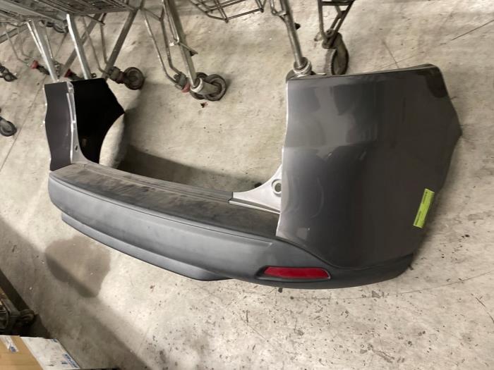 Bakre stötfångare från en Renault Clio IV Estate/Grandtour (7R) 0.9 Energy TCE 12V 2014