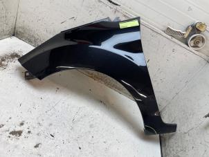 Gebruikte Scherm links-voor Ford Fiesta 6 (JA8) 1.25 16V Prijs € 75,00 Margeregeling aangeboden door Autodemontage van de Laar