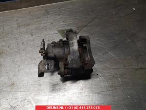 Gebruikte Remklauw (Tang) links-achter Toyota Auris (E15) 1.8 16V HSD Full Hybrid Prijs € 35,00 Margeregeling aangeboden door V.Deijne Jap.Auto-onderdelen BV