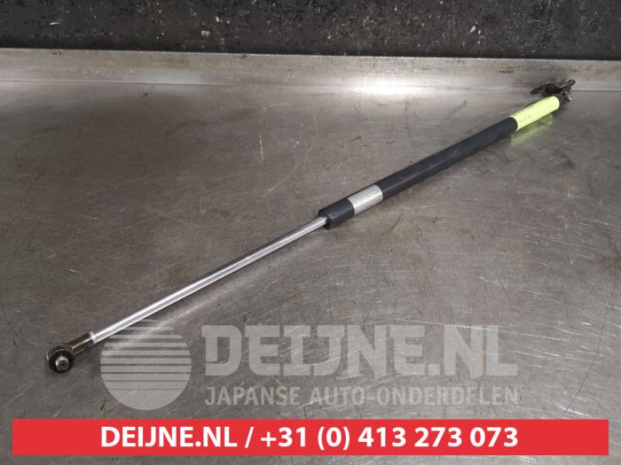 Kofferdekseldemper links-achter van een Honda HR-V (GH) 1.6 16V 4x4 2000