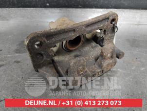 Gebruikte Remklauw (Tang) links-achter Mitsubishi Pajero Hardtop (V6/7) 3.2 DI-D 16V Prijs op aanvraag aangeboden door V.Deijne Jap.Auto-onderdelen BV