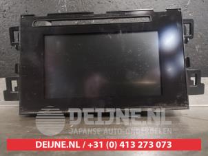 Gebruikte Navigatie Display Mazda CX-5 I (KE,GH) 2.2 SkyActiv-D 150 16V 2WD Prijs € 300,00 Margeregeling aangeboden door V.Deijne Jap.Auto-onderdelen BV