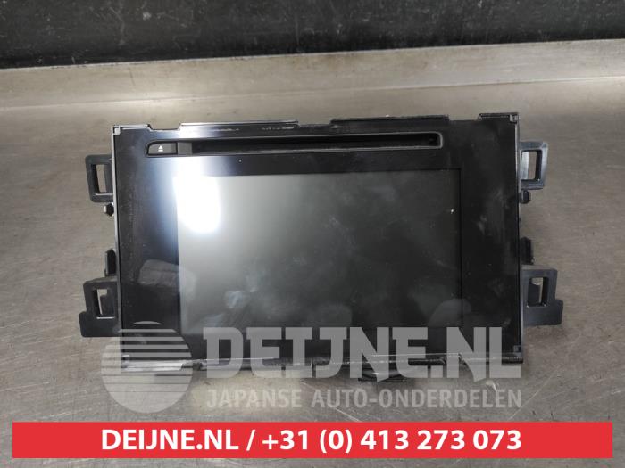 Radio från en Mazda CX-5 I (KE,GH) 2.0 SkyActiv-G 16V 2WD 2016