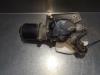 Främre torkarmotor från en Nissan Navara (D40) 2.5 dCi 16V 4x4 2006