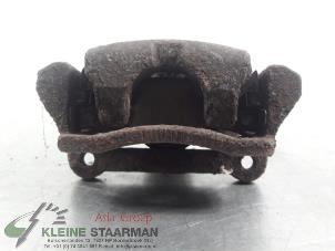 Używane Zacisk hamulcowy prawy tyl Toyota Corolla (E12) 1.6 16V VVT-i Cena € 42,50 Procedura marży oferowane przez Kleine Staarman B.V. Autodemontage