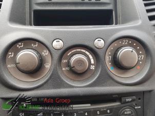 Begagnade Värmekontrollpanel Mitsubishi Grandis (NA) 2.4 16V MIVEC Pris € 90,00 Marginaltabell erbjuds av Kleine Staarman B.V. Autodemontage