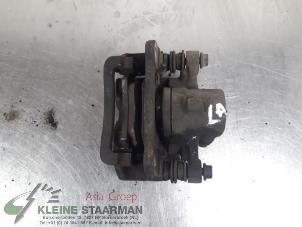 Używane Zacisk hamulcowy lewy tyl Toyota Corolla (E12) 1.6 16V VVT-i Cena € 42,50 Procedura marży oferowane przez Kleine Staarman B.V. Autodemontage