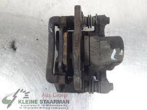 Używane Zacisk hamulcowy prawy tyl Toyota Corolla (E12) 1.6 16V VVT-i Cena € 42,50 Procedura marży oferowane przez Kleine Staarman B.V. Autodemontage