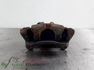 Używane Zacisk hamulcowy lewy tyl Toyota Corolla (E12) 1.6 16V VVT-i Cena € 42,50 Procedura marży oferowane przez Kleine Staarman B.V. Autodemontage