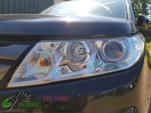 Używane Reflektor lewy Suzuki Vitara (LY/MY) 1.6 16V VVT Cena na żądanie oferowane przez Kleine Staarman B.V. Autodemontage