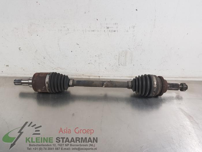 Drivaxel, vänster fram från en Suzuki New Ignis (MH) 1.5 16V 2005